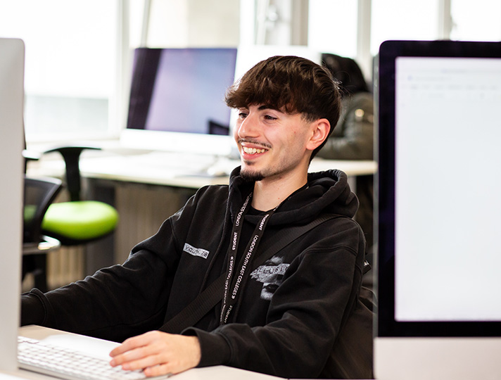 student working at desk in the platform